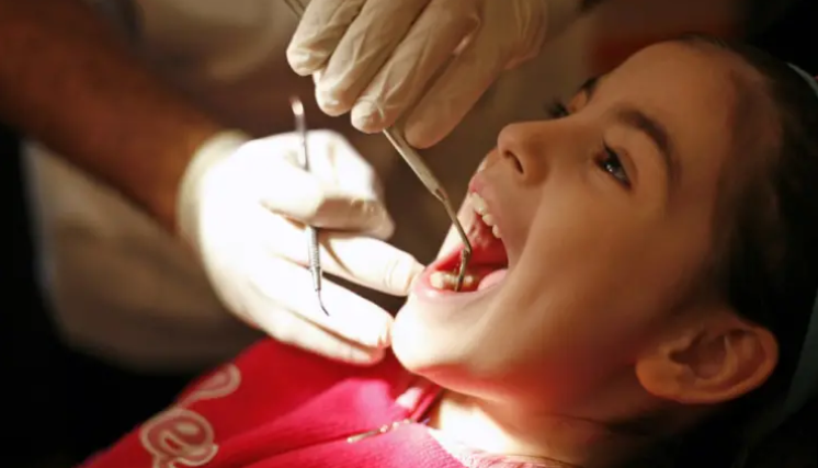 Andrews pledges free dental care for state school kids